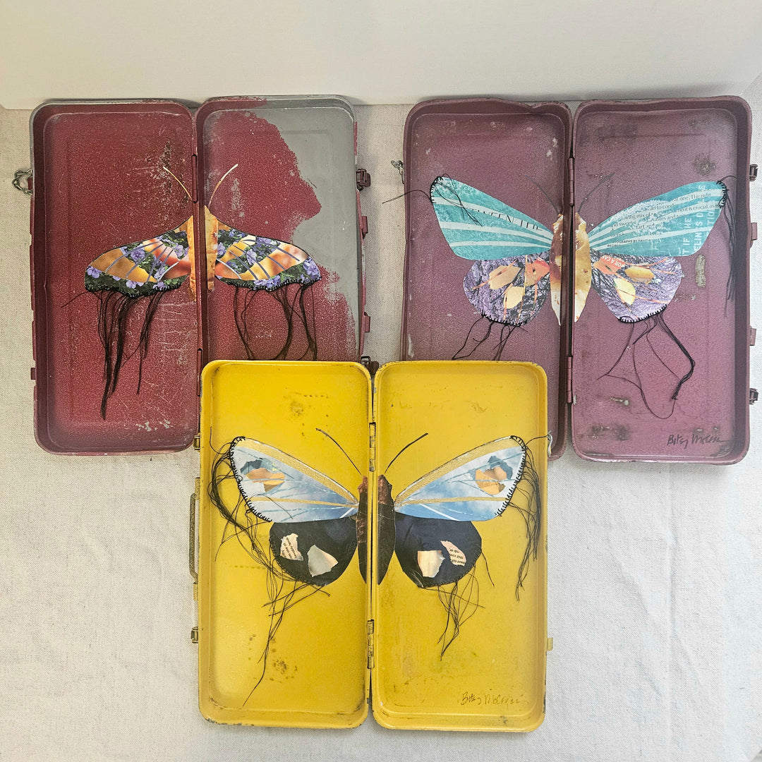 Three butterfly fine art collages made from recycled magazine pages and set into toolboxes