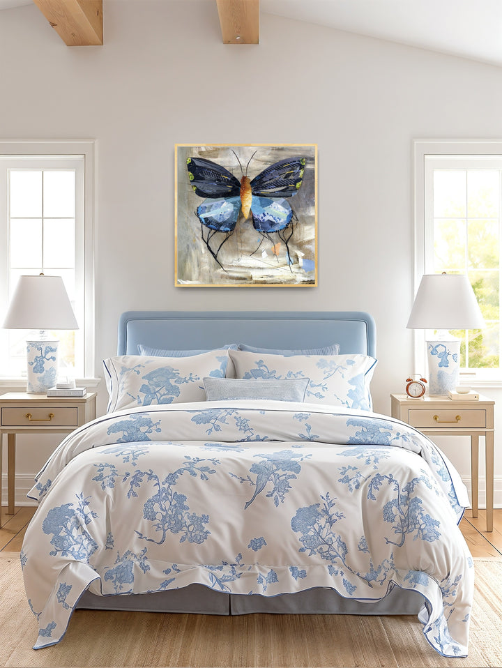 Blue is a butterfly / moth collage created with recycled magazine bits embellished with delicate hand stitching. Museum-quality wall art.