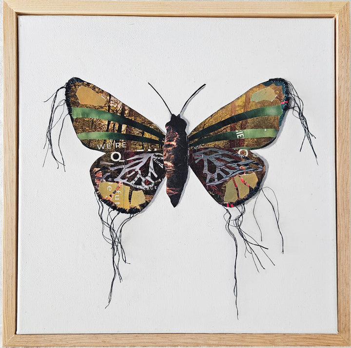 butterfly collage artwork made from recycled magazine pages