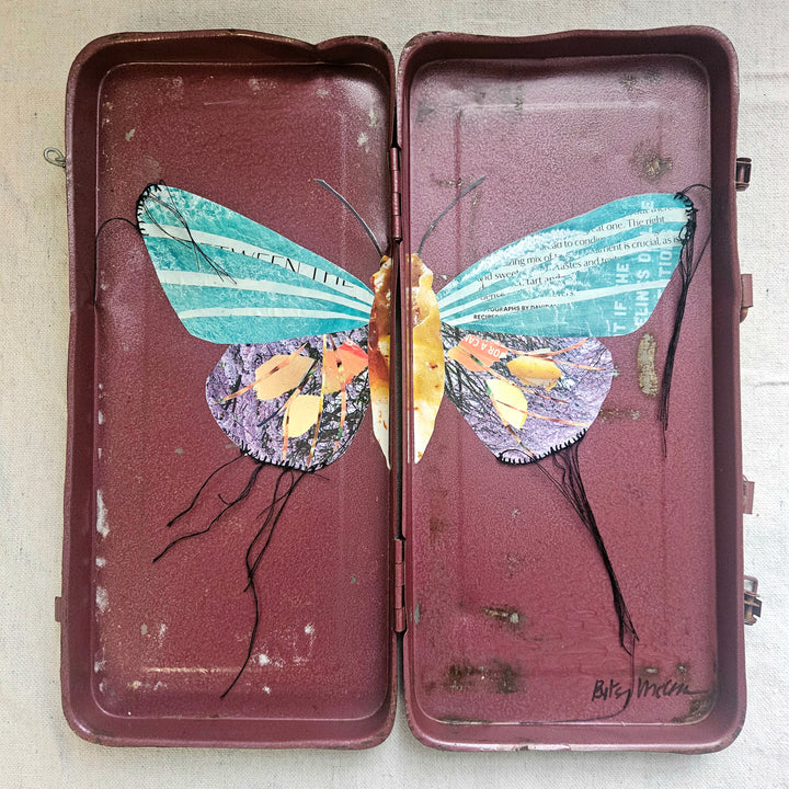 butterfly collage artwork made from recycled magazine pages