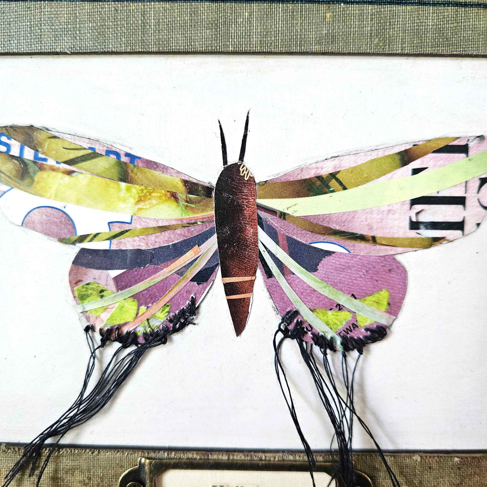 Holly is a one-of-a-kind handmade butterfly moth collage in a vintage book frame. Eco-friendly wall art made from recycled magazines. A unique gift for nature lovers.