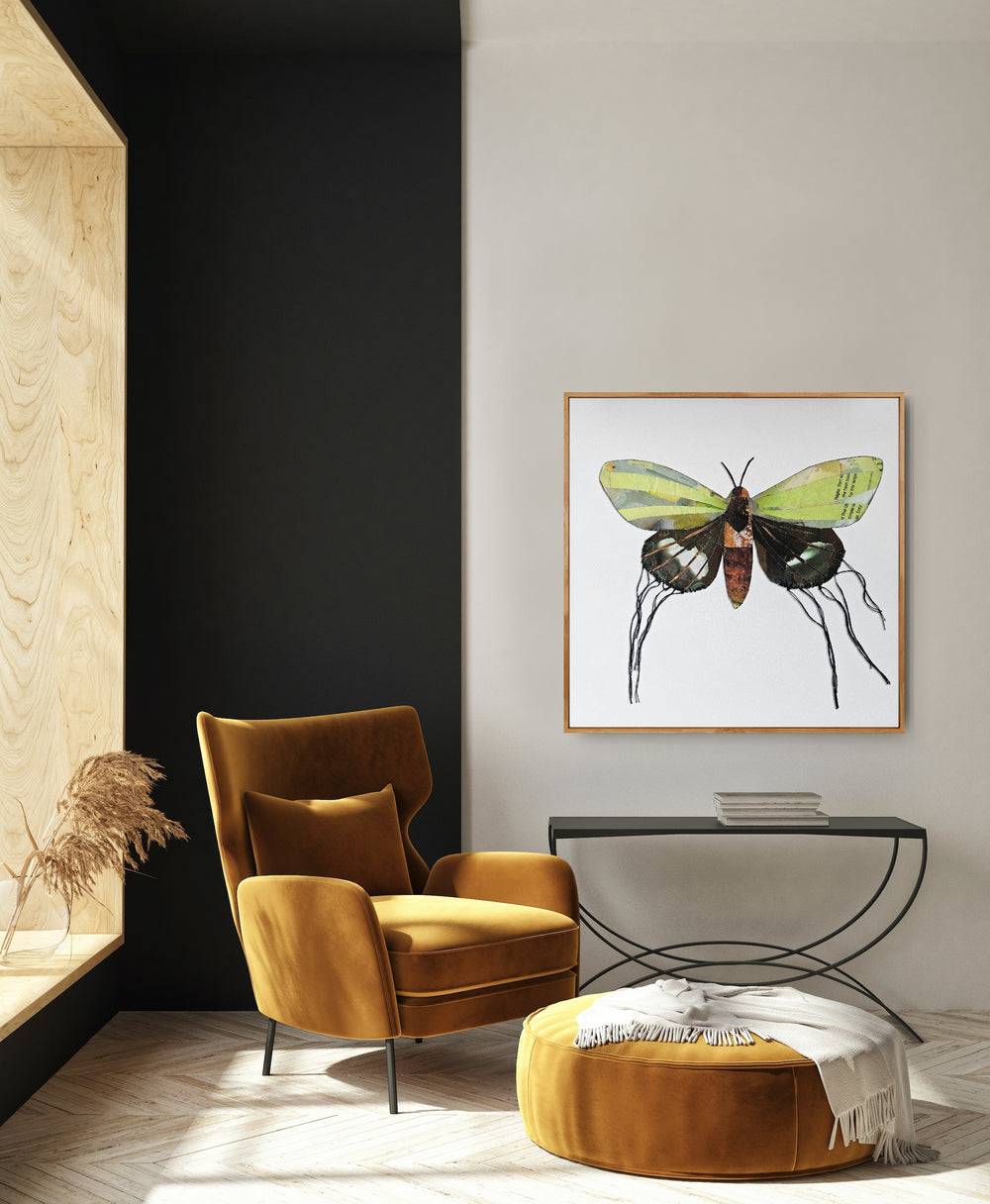 Luna is a butterfly / moth collage created with recycled magazine bits embellished with delicate hand stitching. Museum-quality wall art.