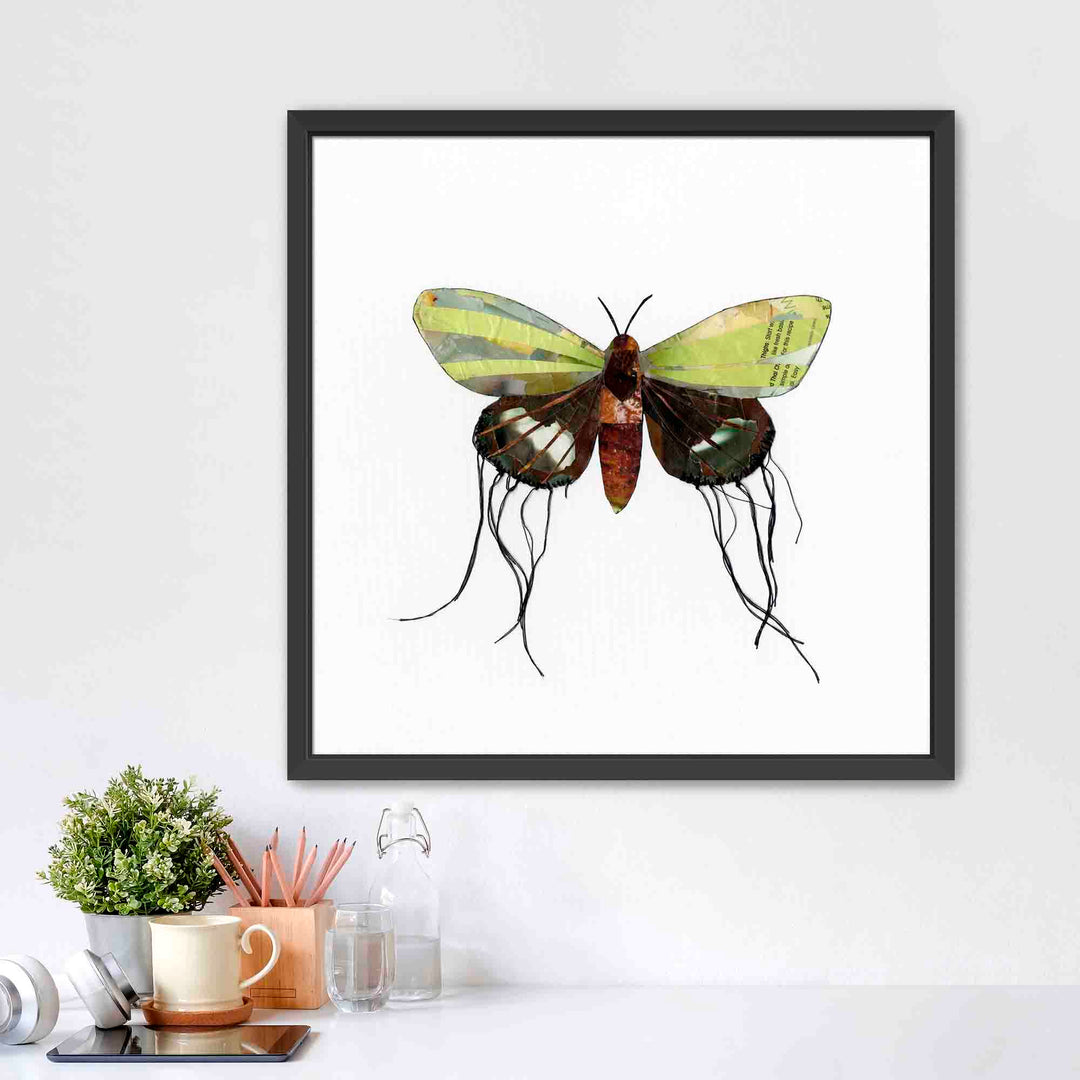 Luna is a butterfly / moth collage created with recycled magazine bits embellished with delicate hand stitching. Museum-quality wall art.