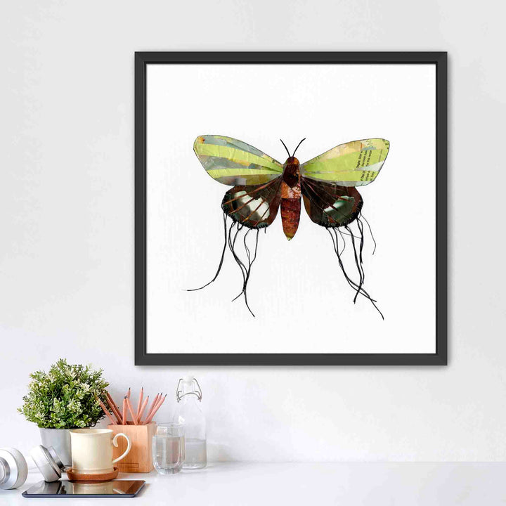 Luna is a butterfly / moth collage created with recycled magazine bits embellished with delicate hand stitching. Museum-quality wall art.