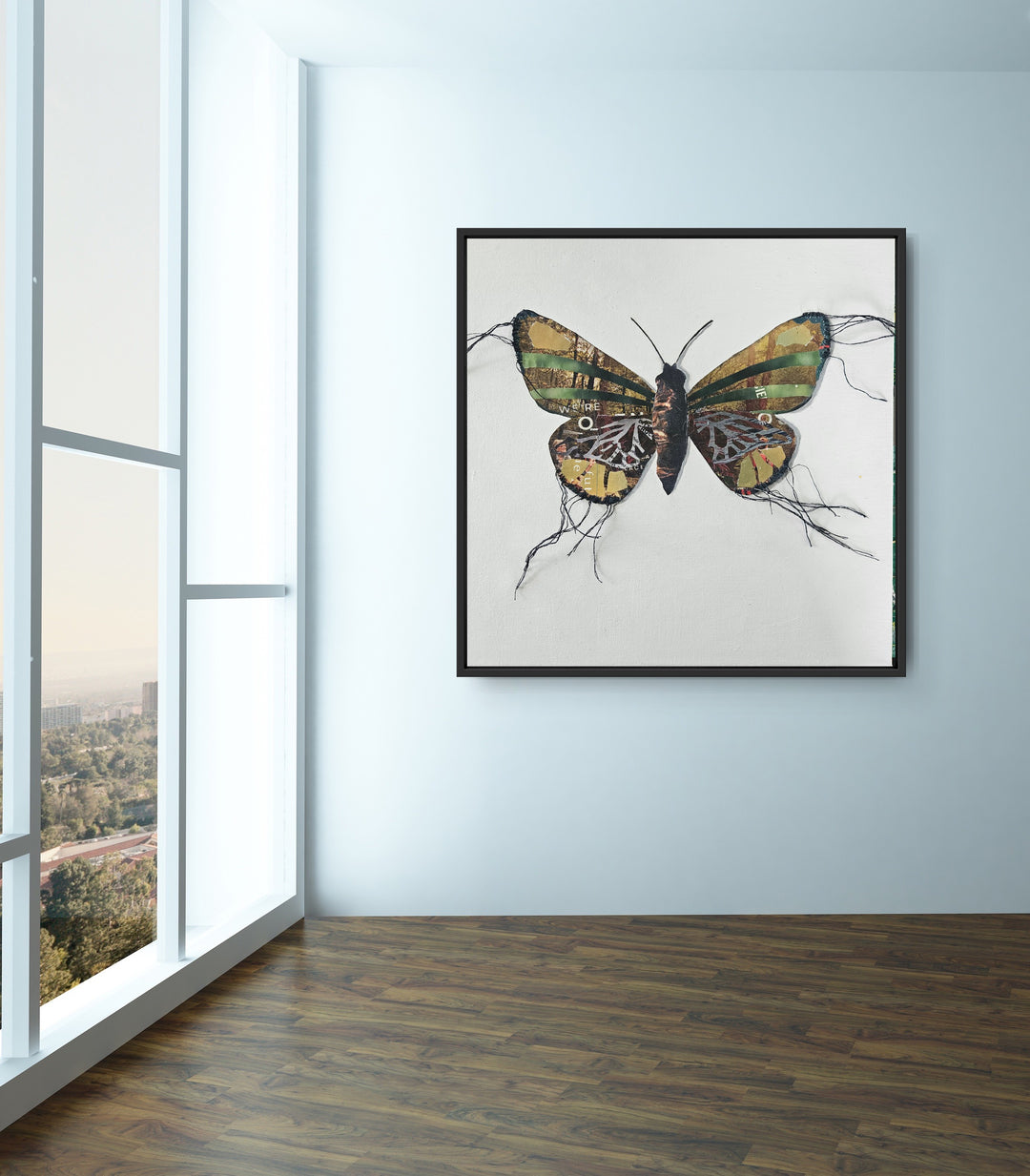 Margaret is a butterfly / moth collage created with recycled magazine bits embellished with delicate hand stitching. Museum-quality wall art.