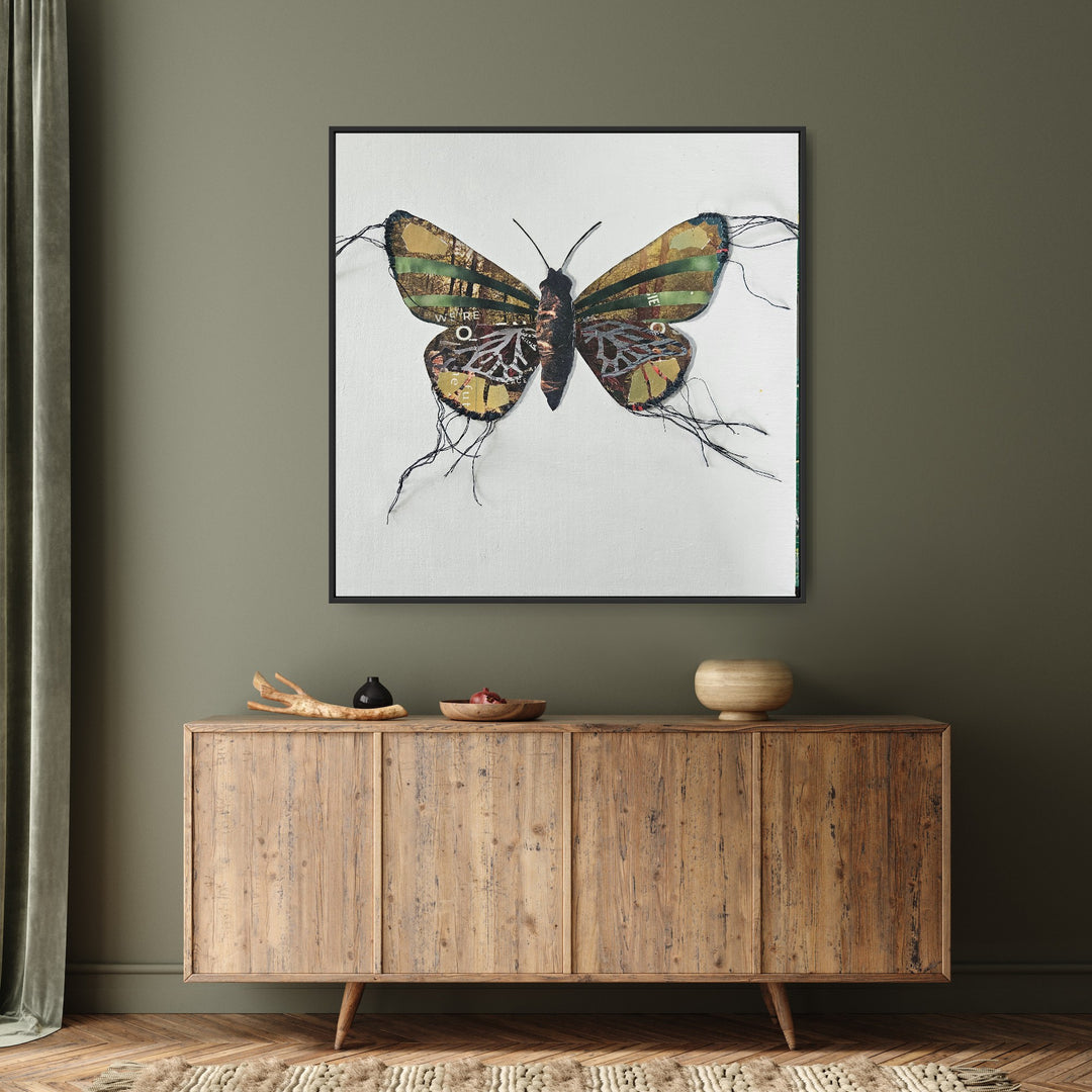 Margaret is a butterfly / moth collage created with recycled magazine bits embellished with delicate hand stitching. Museum-quality wall art.
