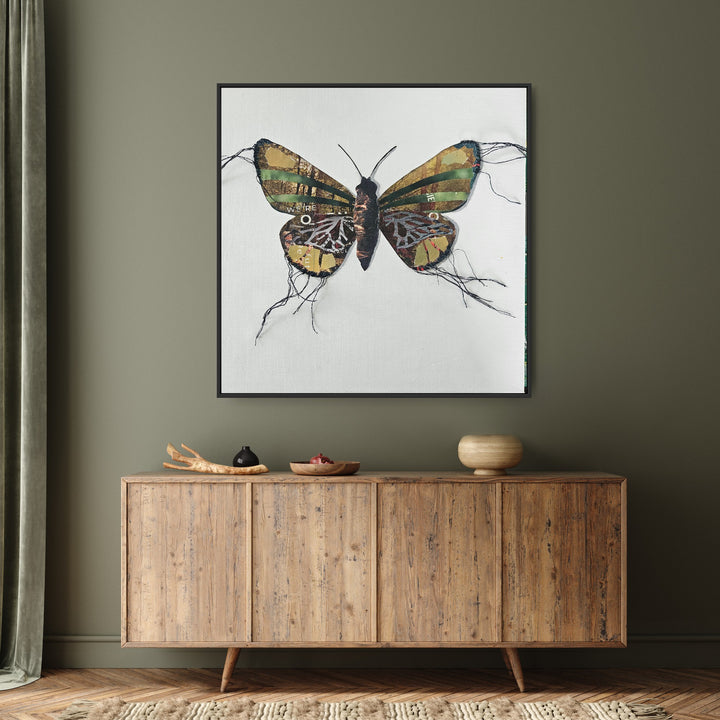 Margaret is a butterfly / moth collage created with recycled magazine bits embellished with delicate hand stitching. Museum-quality wall art.