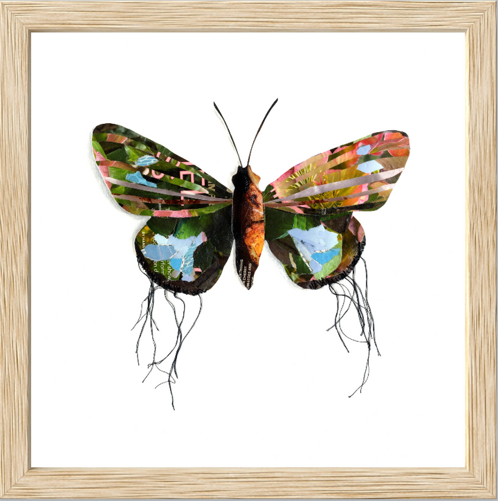Sprite is a butterfly / moth collage created with recycled magazine bits embellished with delicate hand stitching. Museum-quality wall art. Framed in a light wood frame.