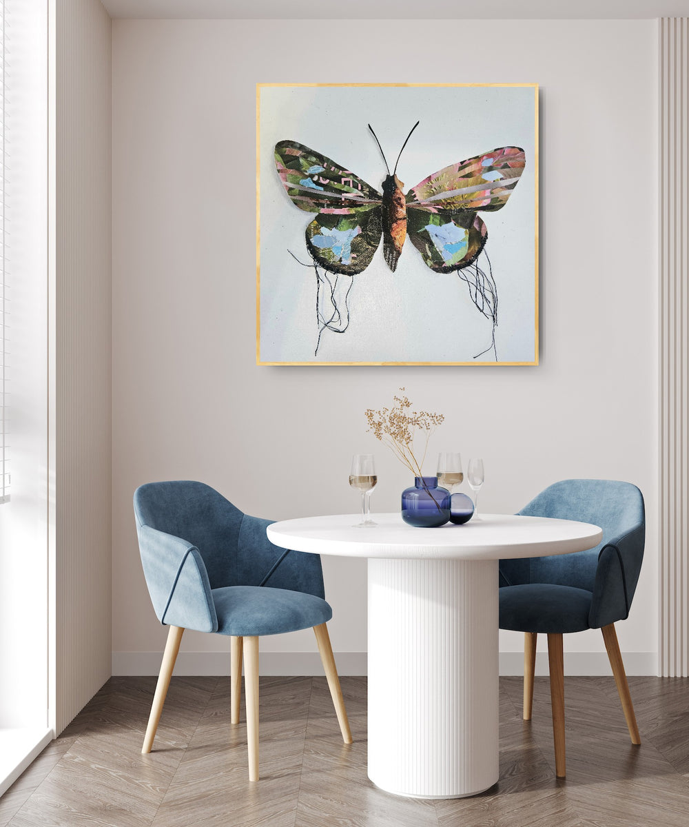 Sprite is a butterfly / moth collage created with recycled magazine bits embellished with delicate hand stitching. Museum-quality wall art.