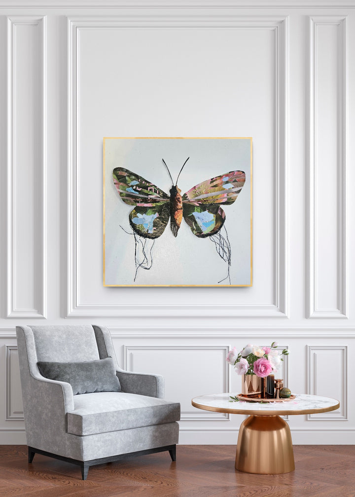 Sprite is a butterfly / moth collage created with recycled magazine bits embellished with delicate hand stitching. Museum-quality wall art.