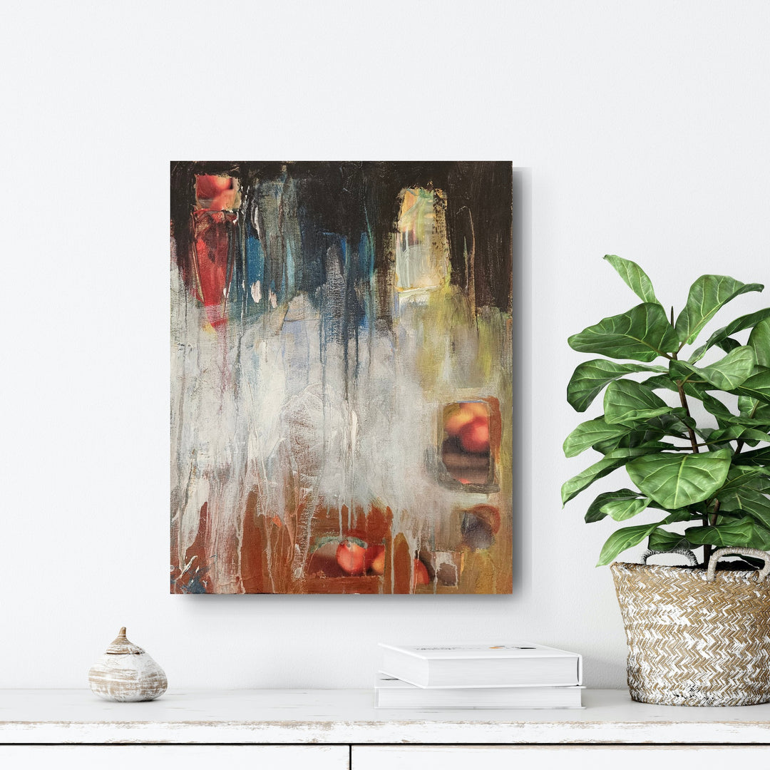Dark abstract painting with apples on wall