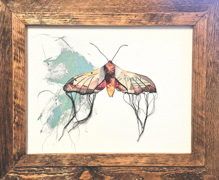 butterfly moth collage artwork made from recycled magazine pages