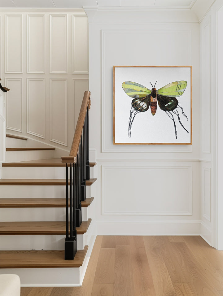 Luna is a butterfly / moth collage created with recycled magazine bits embellished with delicate hand stitching. Museum-quality wall art.