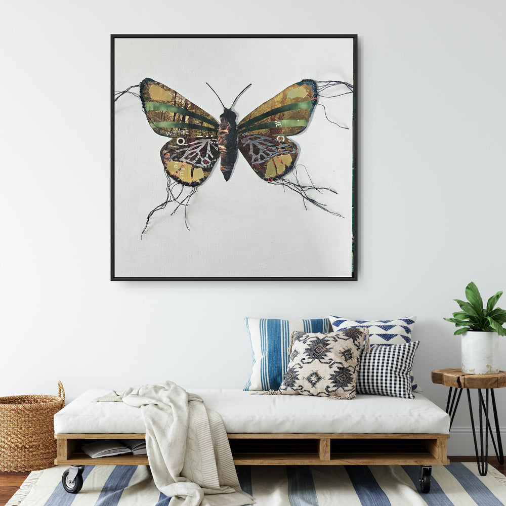 Margaret is a butterfly / moth collage created with recycled magazine bits embellished with delicate hand stitching. Museum-quality wall art.